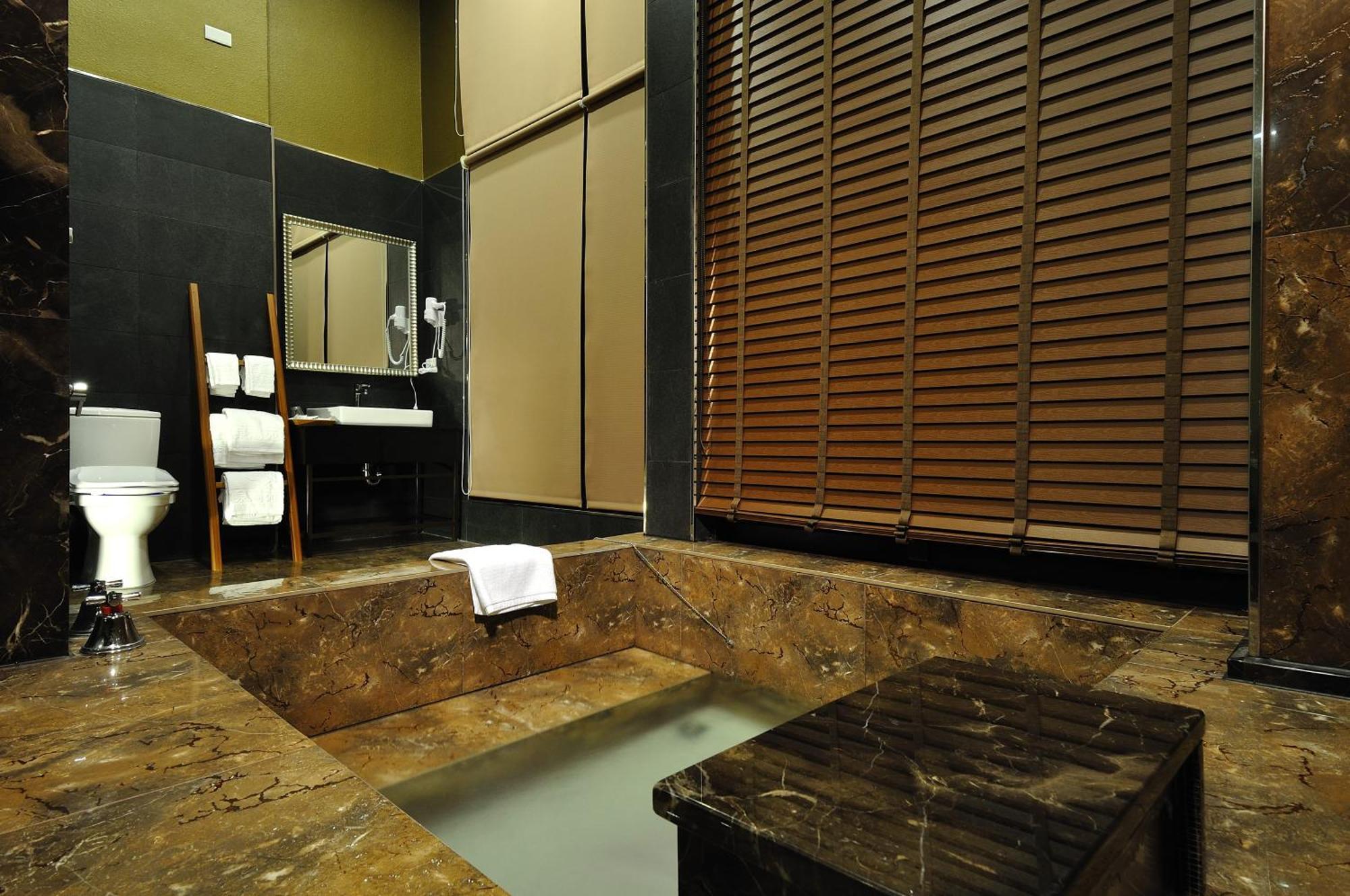 58˚ Hotspring Hotel Csiaohszi Szoba fotó